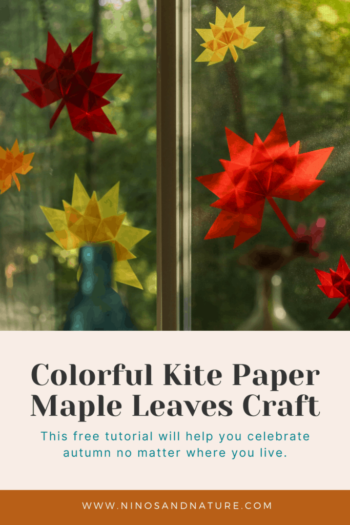 Kite paper maple leaves folded on Waldorf home window decor
