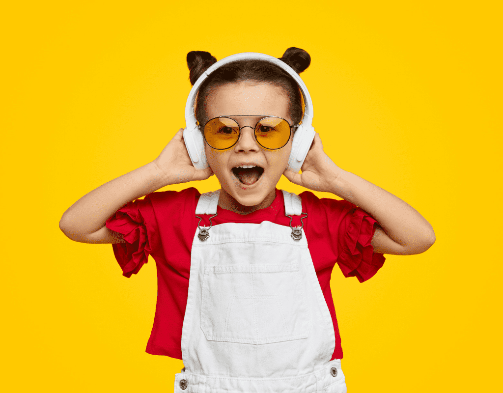 young girl listening to music with headphones